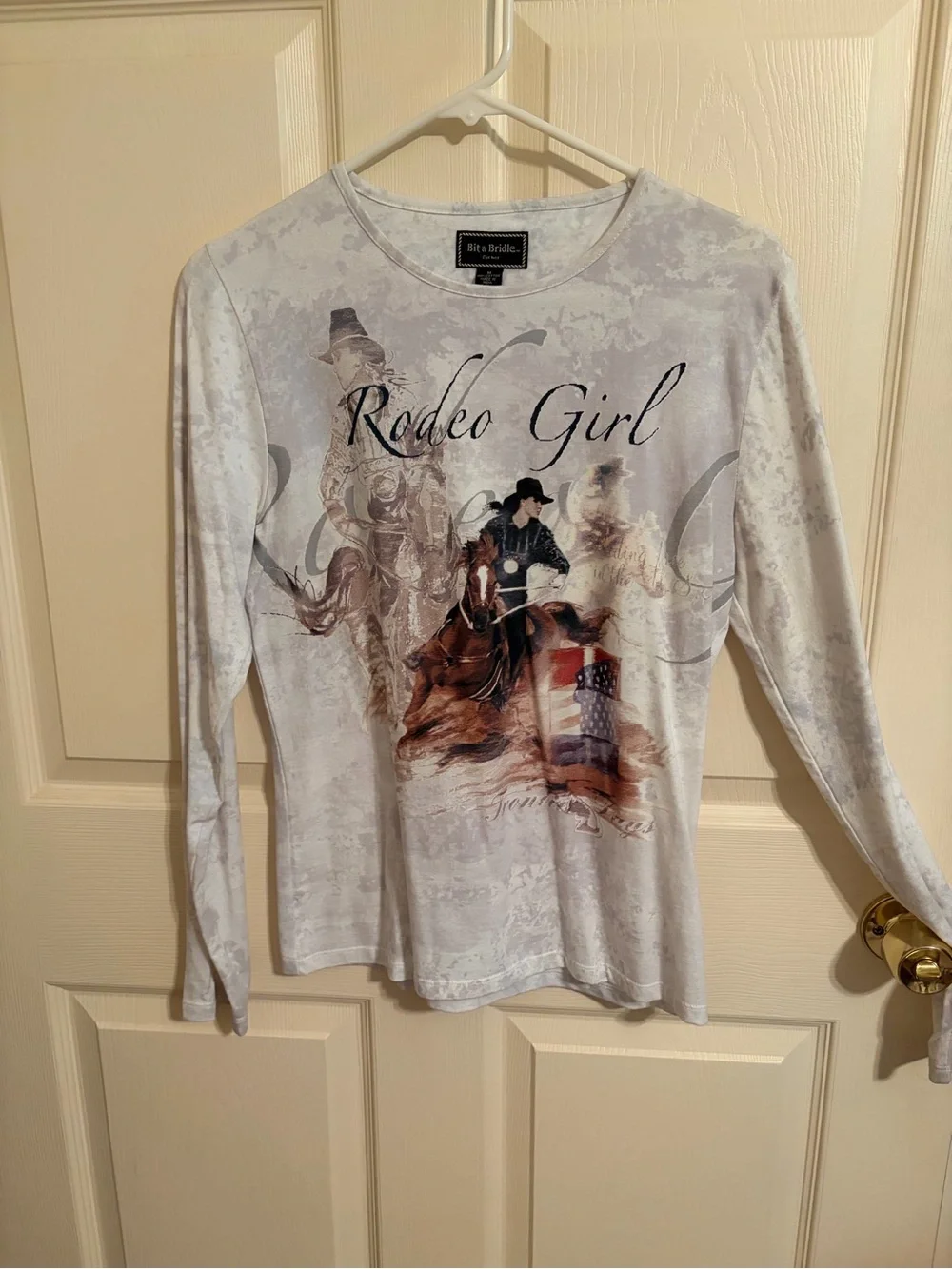 BIT AND BRIDLE “RODEO GIRL” LS tee